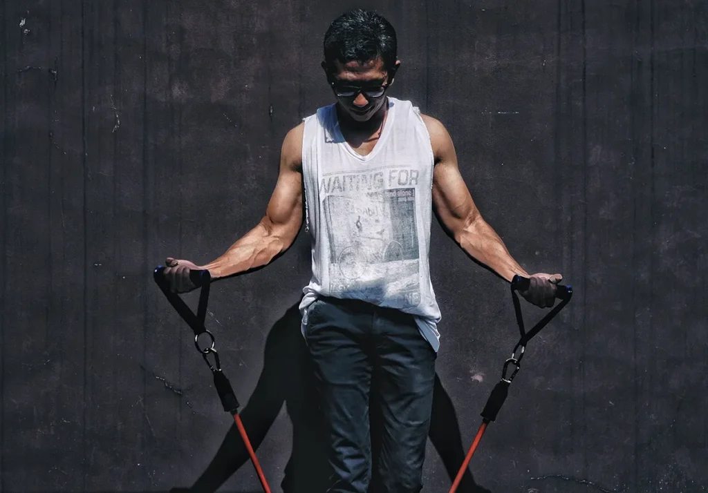 Resistance band bicep curl for arm strength training