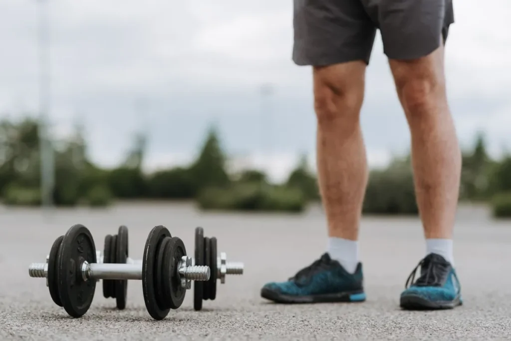 Adjustable dumbbells for strength training in a home gym