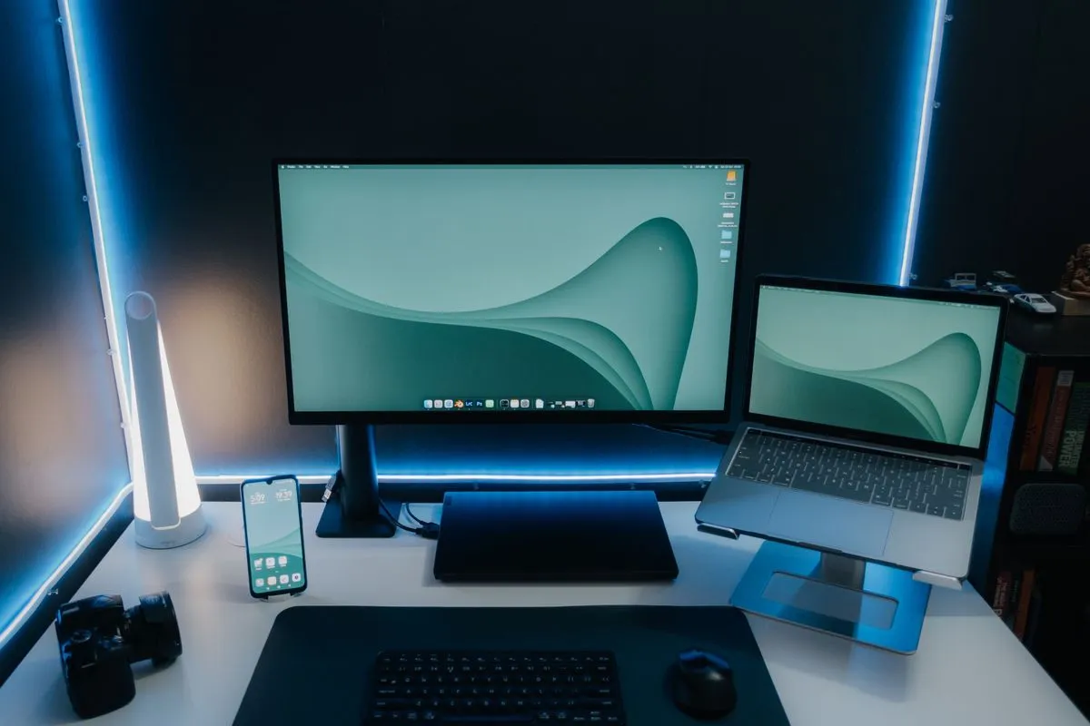 Clean organized workspace with wireless mouse tablet stand and charging hub