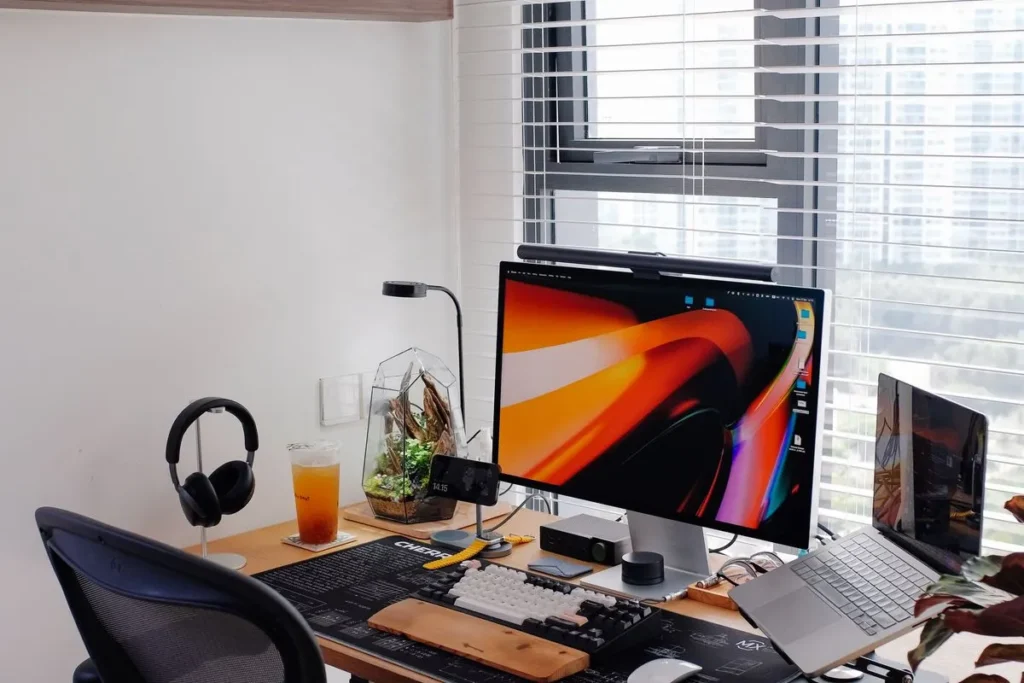 Adjustable tablet and phone stand on a modern office desk